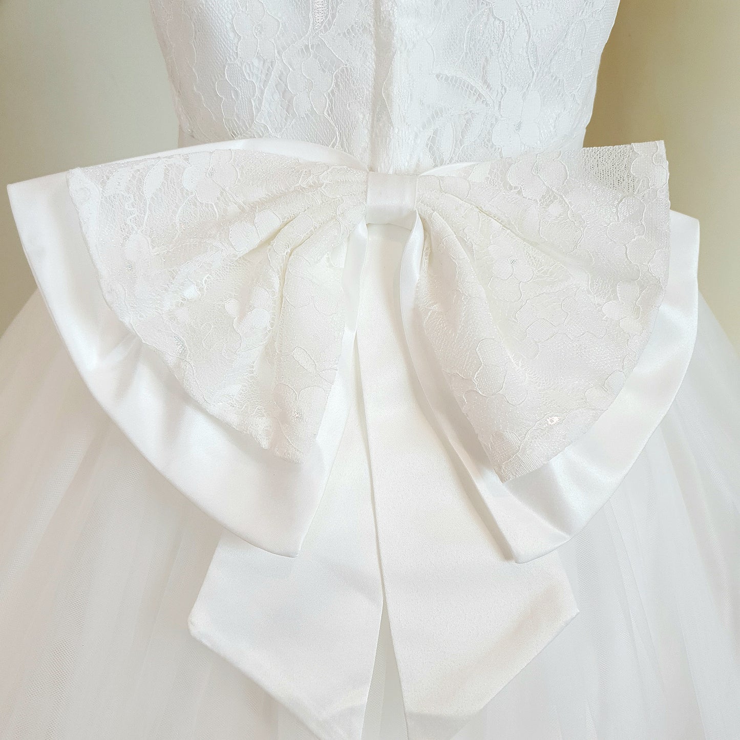 Floral lace and appliques with big bow white dress