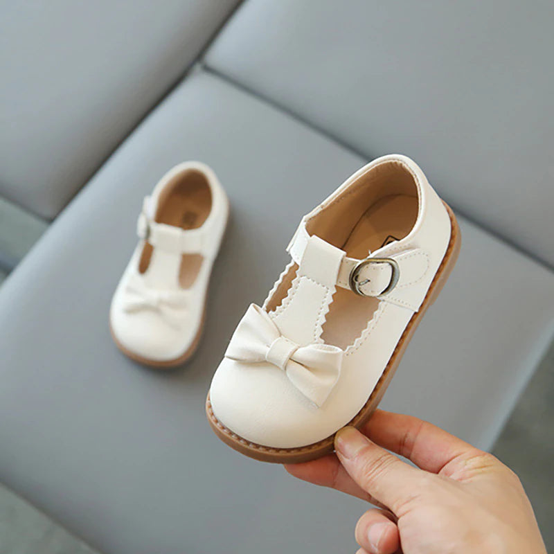 Beige bow mary janes