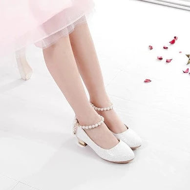 Glitter covered white heels