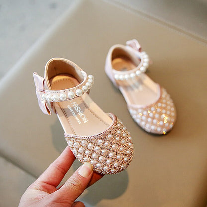 Pearl covered shoes in rose gold