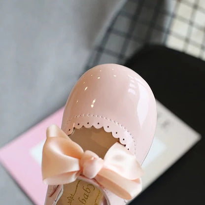 Ribbon bow patent pink shoe
