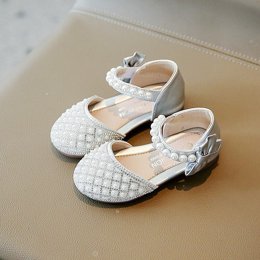 Pearl covered flat shoes in silver